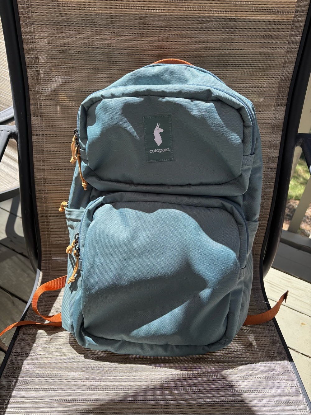 Brand new cotopaxi Teal Backpack with Orange Accents never used!